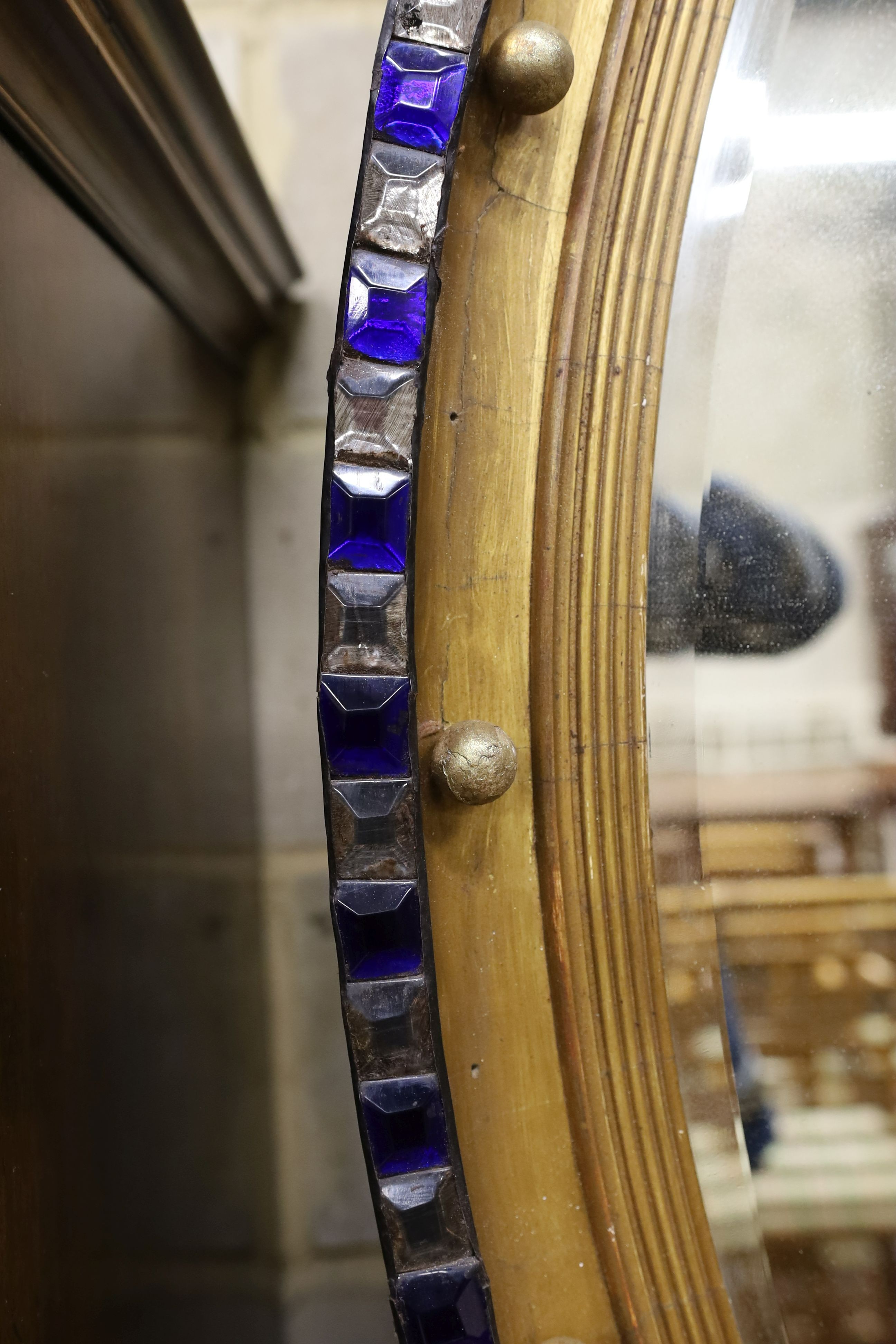 An Irish style oval wall mirror, width 64cm, height 100cm